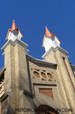 Two Church Spires At Front Corner