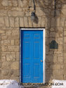 Blue Front Door With Stone Walls