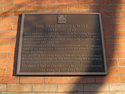 Plaque on the North Drill Hall of hte Armoury
