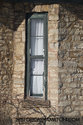 Small Slit Window In Stone Wall