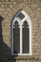 Closeup Of The Church Window With Surrounding Brickwork