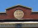 King St W Commercial Building datestone detail