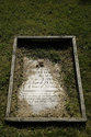 Framed Half Buried Headstone
