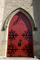 Painted Red Front Door Of The Church