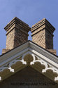 Double Chimney Roof Peak And Wooden Trim