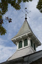 The School Bell Tower And Weather Vane With Lightning Rod